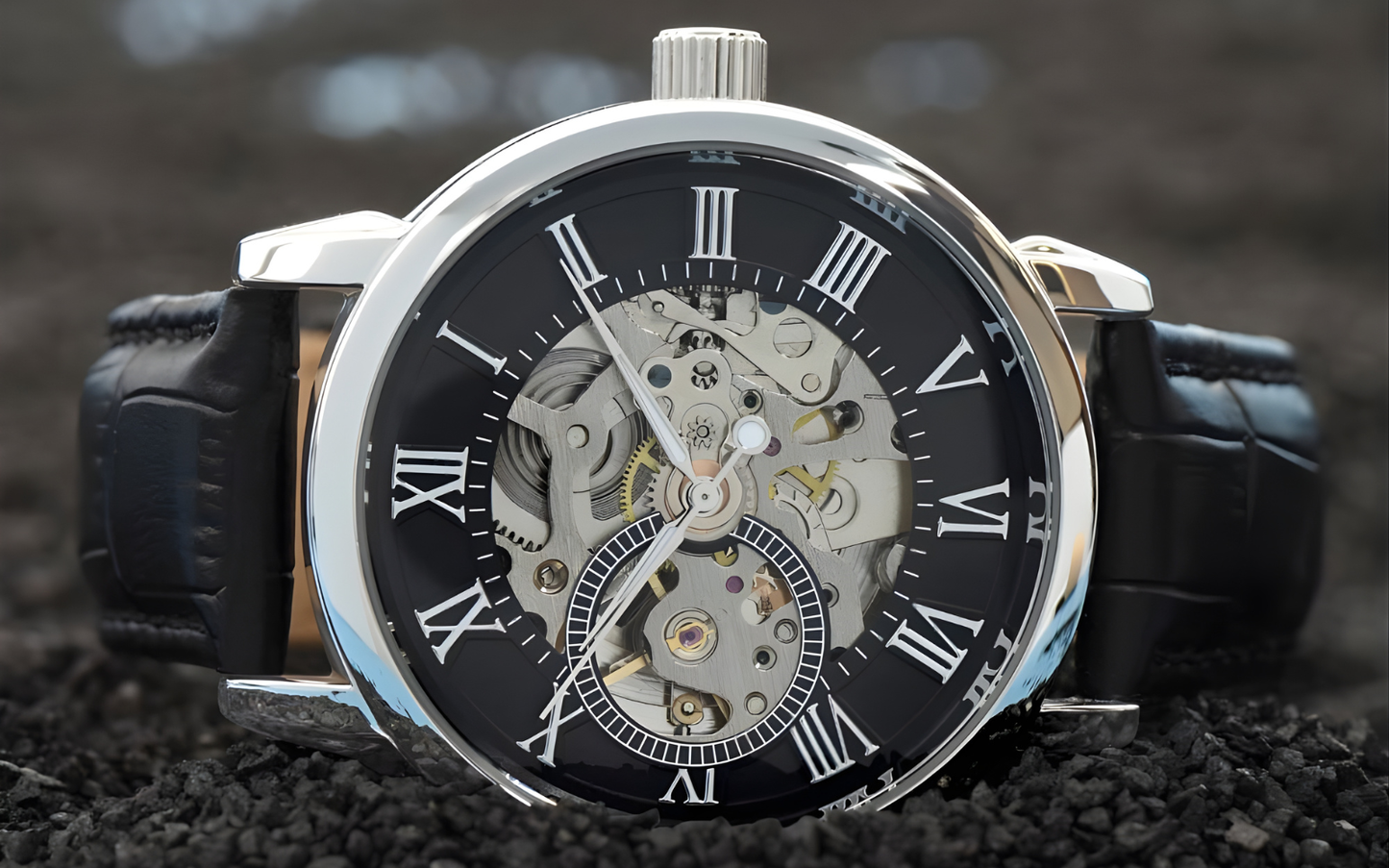 Macro photograph of the Lumen & Oak Signature Openwork watch, showcasing the hand-finished gears and silver-tone mechanical components of the skeletal dial against a dark, textured background.
