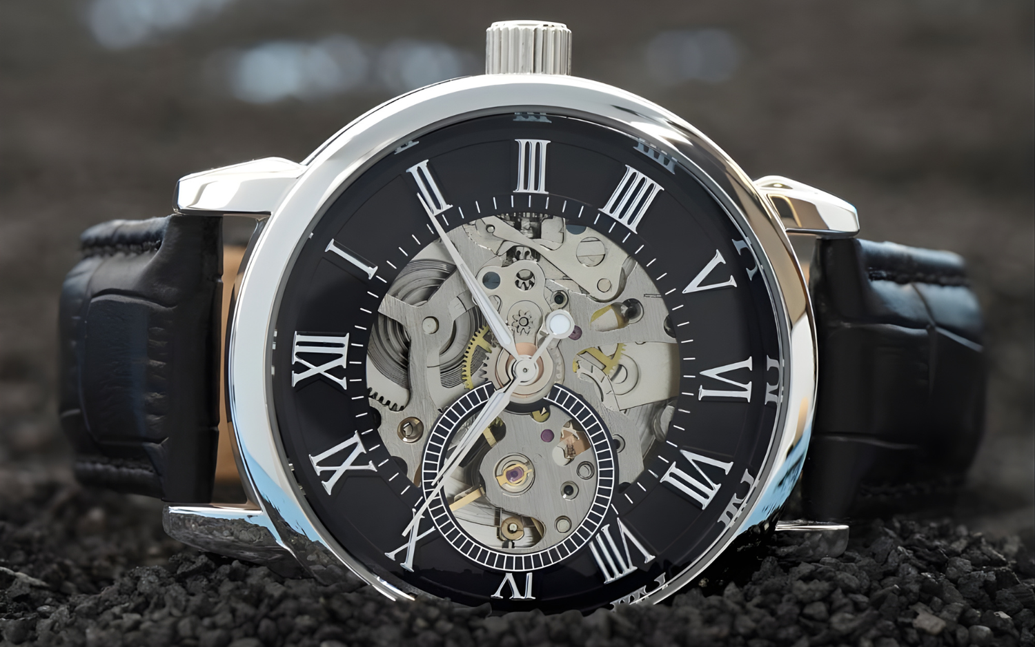 Macro photograph of the Lumen & Oak Signature Openwork watch, showcasing the hand-finished gears and silver-tone mechanical components of the skeletal dial against a dark, textured background.