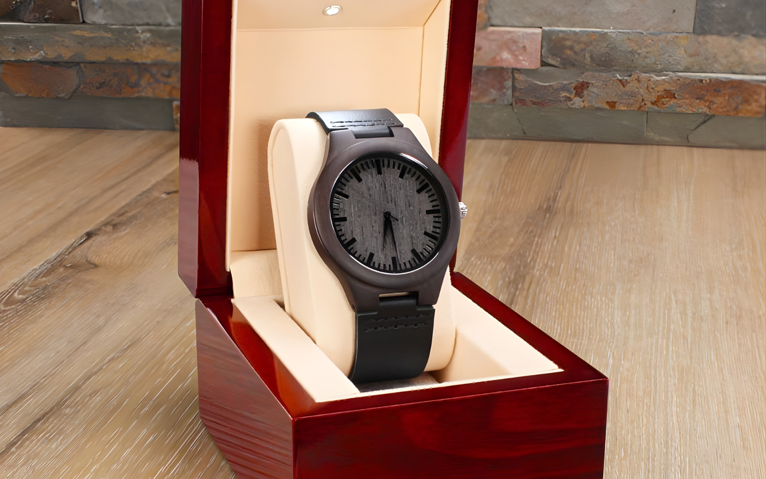 Lumen & Oak Sandalwood Legacy watch with a natural wood grain dial and black leather strap, presented in a high-gloss mahogany-finish luxury gift box with internal LED lighting.